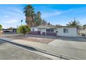 House exterior showcasing curb appeal and street view at 1720 Sweeney Ave, Las Vegas, NV 89104