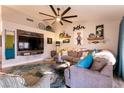 Open concept living area featuring a cozy sectional sofa at 8653 Prairie Hill Dr, Las Vegas, NV 89134