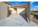 Attached garage with open gate, offering convenient access at 7630 Stetson Bluff Ave, Las Vegas, NV 89113