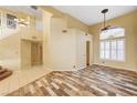 Spacious living area with tile flooring and high ceilings at 1708 Jack Rabbit Way, Las Vegas, NV 89128