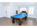 Game room featuring a pool table and hardwood floors at 6401 Home Run Dr, Las Vegas, NV 89130