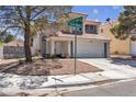 Two-story house with attached garage and street view at 7809 Cocoa Beach Cir, Las Vegas, NV 89128