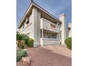 Building exterior showcasing a balcony and landscaping at 7300 Pirates Cove Rd # 1087, Las Vegas, NV 89145