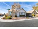 Single-story house with carport and landscaping at 709 Jonathan Glen Way, Las Vegas, NV 89145