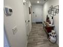 Bright entryway with wood-look floors and decorative accents at 6843 Toros St, North Las Vegas, NV 89086