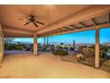 Covered patio with mountain views and ceiling fan at 2220 Canyonville Dr, Henderson, NV 89044