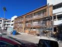 Building undergoing renovations, showcasing exposed framing and scaffolding at 1381 E University Ave # 102, Las Vegas, NV 89119