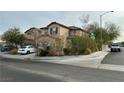 Two-story house situated on a corner lot with street view at 9505 W Gilmore Ave, Las Vegas, NV 89129