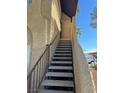 Exterior condo staircase leading to second floor units at 5071 Pioneer Ave # 203, Las Vegas, NV 89146