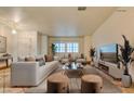 Virtually staged living room with modern furniture and decor at 6105 Heather Mist Ln, Las Vegas, NV 89108