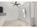 Small dining area with ceiling fan and wood-look floors at 5834 Vegas Dr, Las Vegas, NV 89108