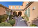 Elegant entry with a courtyard and fountain at 6 Caves Valley Ct, Henderson, NV 89052