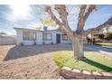 Charming single story home with mature tree and updated landscaping at 6121 Denver Cir, Las Vegas, NV 89107