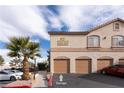 Condo building with attached garages at 1830 N Buffalo Dr # 2095, Las Vegas, NV 89128