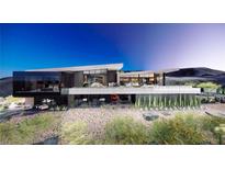 Modern home with expansive windows and desert landscaping at 1522 Dragon Crest, Henderson, NV 89012