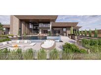 Luxury home with resort style pool and outdoor living spaces at 555 Magma Peak Dr, Henderson, NV 89012