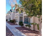 Two story building with landscaped grounds at 5211 Lindell Rd # 207, Las Vegas, NV 89118