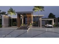 Modern house exterior with a porte cochere and palm trees at 587 Lairmont, Henderson, NV 89012