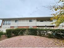 Exterior view of a condo building with landscaping at 2838 Geary Pl # 4006, Las Vegas, NV 89109