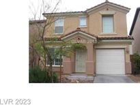 Two-story house with attached garage and landscaping at 552 Brompton St, Las Vegas, NV 89178