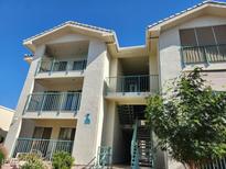 Two-story building with balconies and teal accents at 3550 Bay Sands Dr # 3049, Laughlin, NV 89029