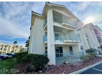 Two-story condo building with balconies and parking at 3550 Bay Sands Dr # 1016, Laughlin, NV 89029