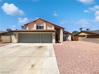 Two-car garage and nicely landscaped front yard at 2462 Marlene Way, Henderson, NV 89014
