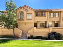 Two-story townhome with landscaped lawn at 3466 Dry Gulch Dr # 0, Laughlin, NV 89029