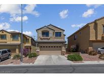 Two-story home with beige exterior, two-car garage, and landscaping at 6434 Diego Dr, Las Vegas, NV 89156
