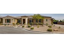 Beautiful two-story home with desert landscaping at 5872 Shangri La Night Ct, Las Vegas, NV 89149
