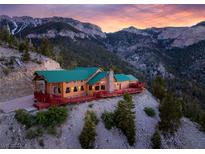Mountaintop home with stunning sunset views at 4910 Cougar Ridge Trl, Mount Charleston, NV 89124