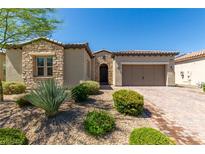 One-story home with stone accents and two-car garage at 5916 Yellow Ridge Ave, Las Vegas, NV 89131