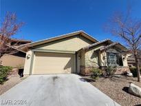 One-story home with attached garage and landscaping at 5564 Bethany Bend Dr, Las Vegas, NV 89135