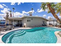 Inviting kidney shaped pool with ample patio space at 3964 Acapulco Ave, Las Vegas, NV 89121