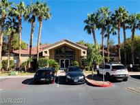Community building with palm trees and parking at 3355 Cactus Shadow St # 101, Las Vegas, NV 89129