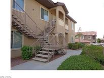 Building exterior showcasing stairs and landscaping at 3500 Cactus Shadow St # 203, Las Vegas, NV 89129