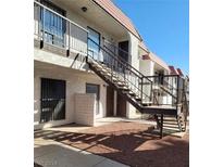 Building exterior with stairs leading to upper level units at 4300 N Lamont St # 232, Las Vegas, NV 89115