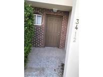 Attractive front door entrance to a brick building at 3412 Townhouse Dr, Las Vegas, NV 89121