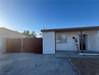 House exterior featuring a carport and a well-maintained front yard at 2137 E Saint Louis Ave, Las Vegas, NV 89104