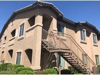 Two-story building with stairs and landscaping at 8985 S Durango Dr # 1143, Las Vegas, NV 89113