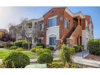 Two story building with landscaped grounds at 9303 Gilcrease Ave # 2219, Las Vegas, NV 89149