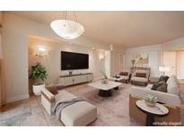 Virtually staged living room with modern furniture at 2777 Paradise Rd # 1202, Las Vegas, NV 89109