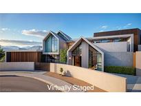 Modern home with sleek design and landscaping at 6 Climbing Canyon Dr, Henderson, NV 89052