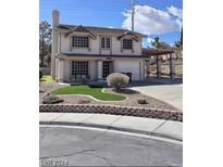 Two-story house with landscaped yard and driveway at 2813 Cacto Ct, Henderson, NV 89074