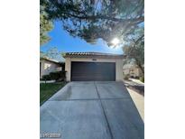 Single car garage with driveway at 2459 Domingo St, Las Vegas, NV 89121
