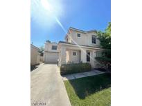 Two-story house with attached two-car garage at 9801 Bradford Summit St, Las Vegas, NV 89183