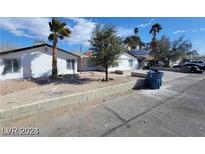 Single story home with landscaped yard at 1710 Shadow Mountain Pl, Las Vegas, NV 89108