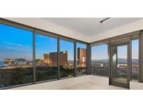 Living room with stunning Strip views at 360 E Desert Inn Rd # 1703, Las Vegas, NV 89109