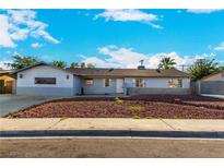 Ranch style home with a well-manicured front yard at 2100 Las Flores St, Las Vegas, NV 89102