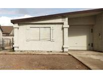 Ranch style home with a single car garage and well-maintained landscaping at 3630 Three Bars Ct, Las Vegas, NV 89115